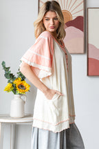 Washed oversized wavy hem v neck short sleeve top